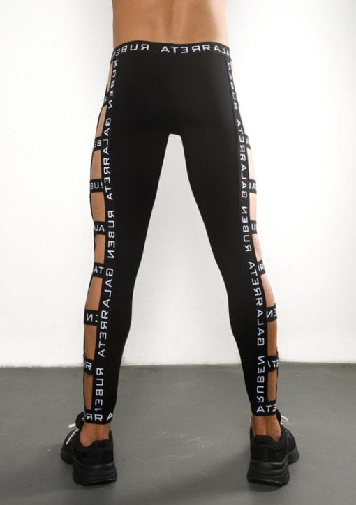 Black man legging strappedpants with cut outs.