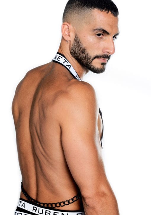 back view of a hot model wearing a ruben galarreta harness